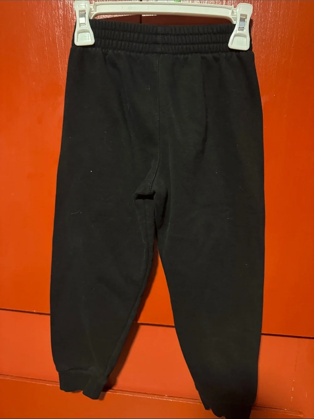 Nike Kids Black Joggers with White Swoosh
